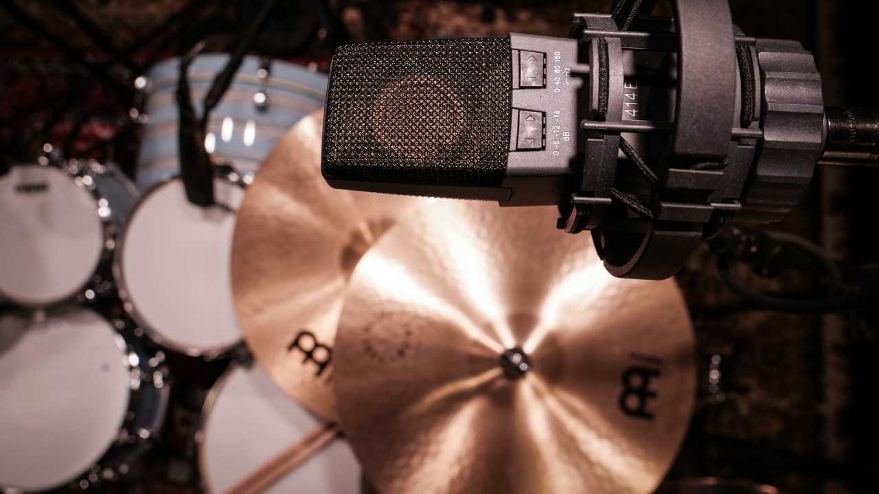 Overhead microphone positioned above a drum kit
